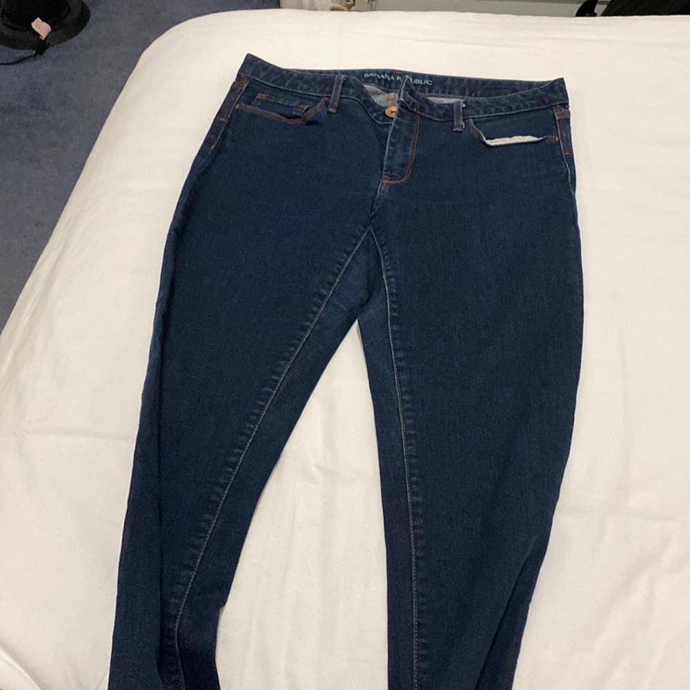 Size 29, dark washed skinny jeans